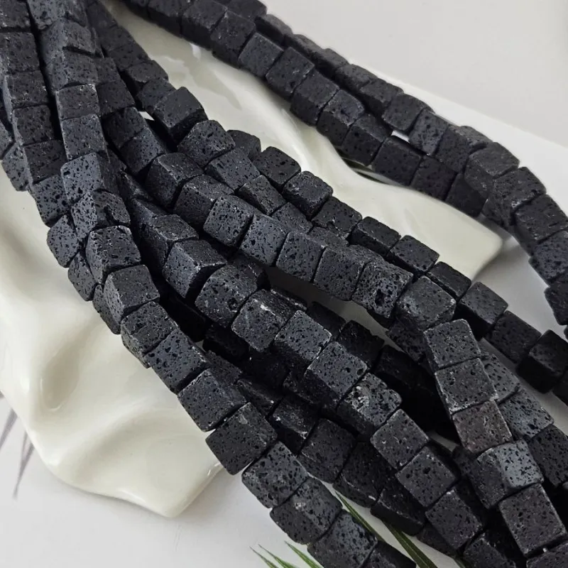 Нить 19 см Лава натуральная бусины куб ок. 10-11 мм черный (4559-10) купить в Воронеже | Заказать в интернет-магазине Viva Beads
