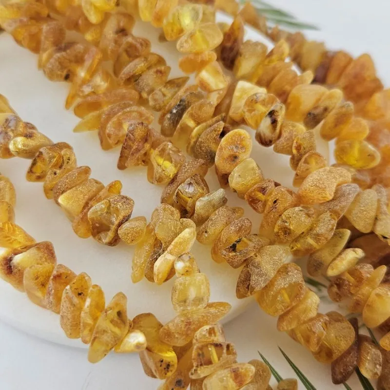 10 см Бусины из натурального нешлифованного янтаря чипсы 11-16х3-5 мм (10017) купить в Воронеже | Заказать в интернет-магазине Viva Beads
