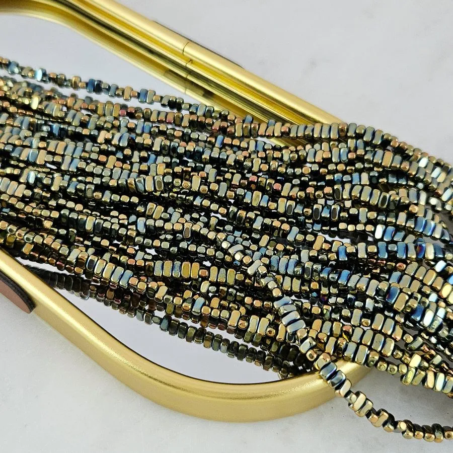 Нить 39 см Гематит, гематин 4х2 мм прямоугольные бусины, цвет хамелеон (6205-Х) для бижутерии купить с доставкой по России | Интернет‑магазин Viva Beads
