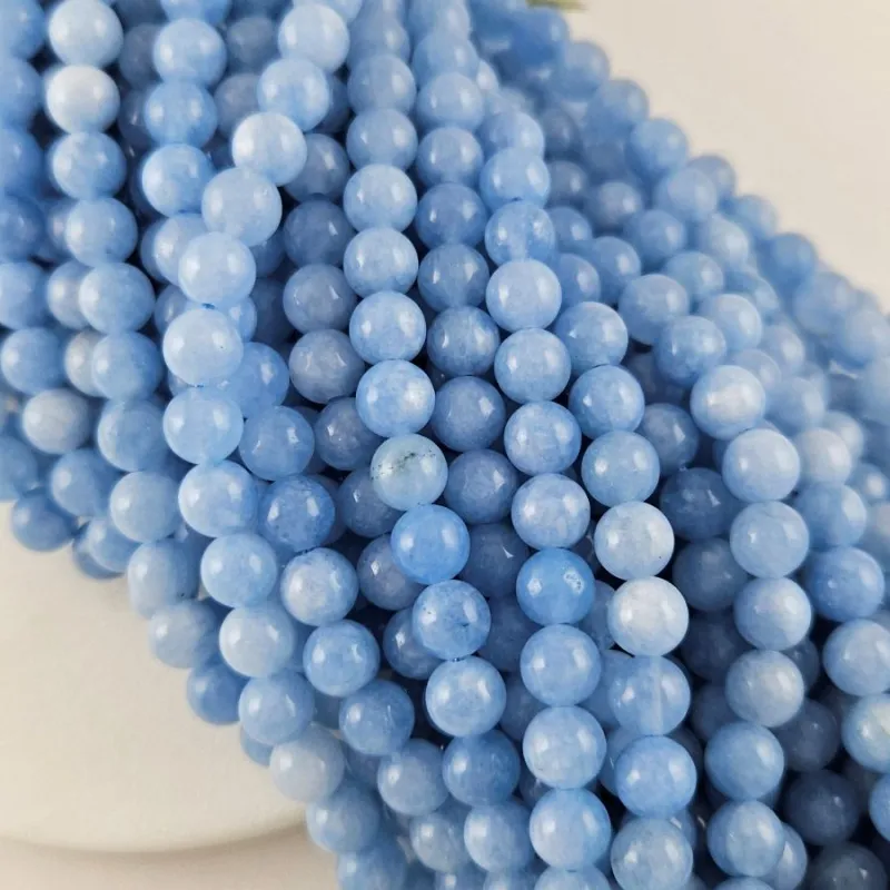 Нить 38 см Кварц тонированный 6-6.5 мм гладкие бусины, голубой  (10026-6) купить в Воронеже | Заказать в интернет-магазине Viva Beads
