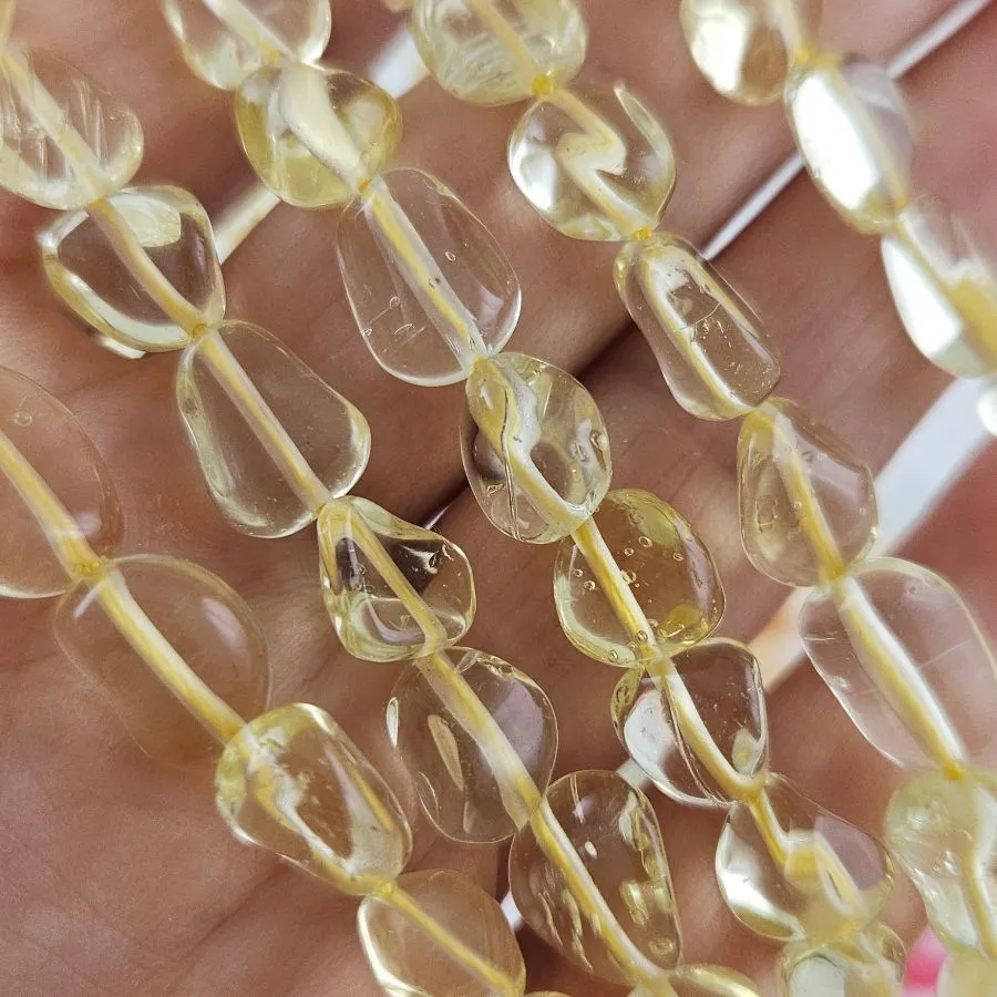 Нить 40 см Кварц лимонный синтетический ок. 4-7.5х9-12 бусины  фри форм, галтовка (9021) для бижутерии купить с доставкой по России | Интернет‑магазин Viva Beads
