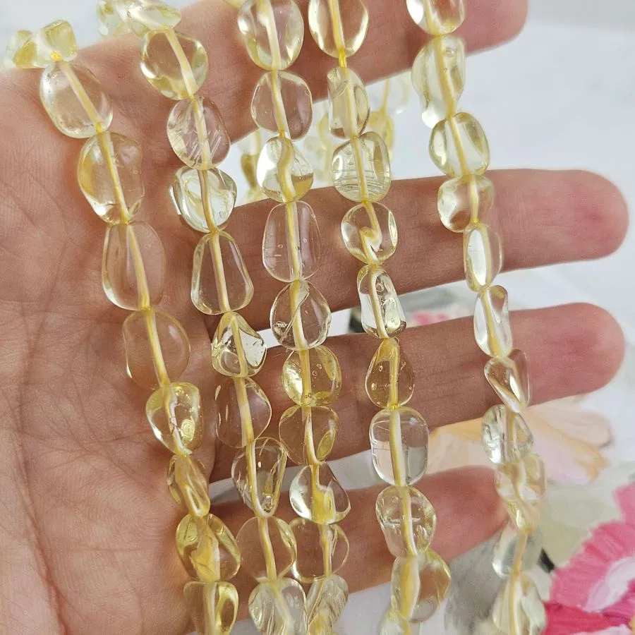 Нить 40 см Кварц лимонный синтетический ок. 4-7.5х9-12 бусины  фри форм, галтовка (9021) для бижутерии купить с доставкой по России | Интернет‑магазин Viva Beads

