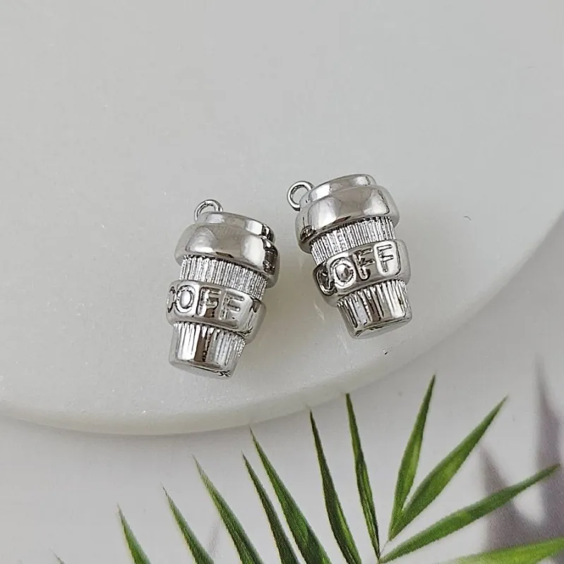 Подвеска Стакан термокружка 16.2x9.6 мм родиевое покрытие (9951-Р) Подвеска Стакан термокружка 16.2x9.6 мм родиевое покрытие (9951-Р)