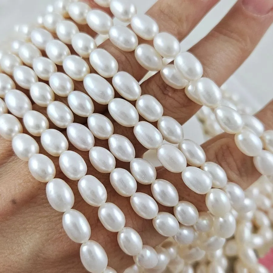 Нить 18 см Жемчуг натуральный речной рис 6-6.3х8.5-10 мм, белый АА (5582) купить с доставкой по России | Интернет-магазин Viva Beads