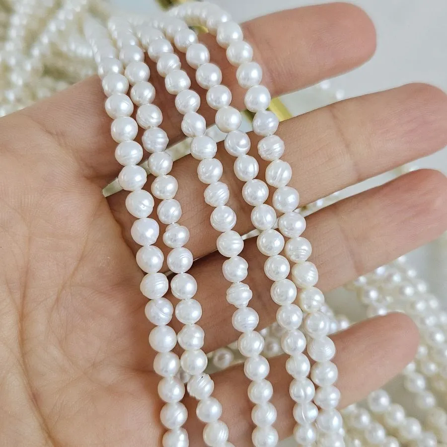 Нить 19 см Жемчуг натуральный речной ок. 4-5 мм, форма картофель, АА, белый (4616) купить с доставкой по России | Интернет-магазин Viva Beads
