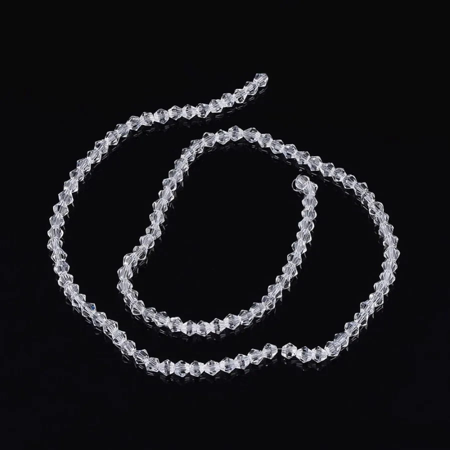 Нить 30 см Хрустальные бусины биконус ок. 4 мм, прозрачный (8462-4-ПРОЗ) купить с доставкой по России | Интернет-магазин Viva Beads