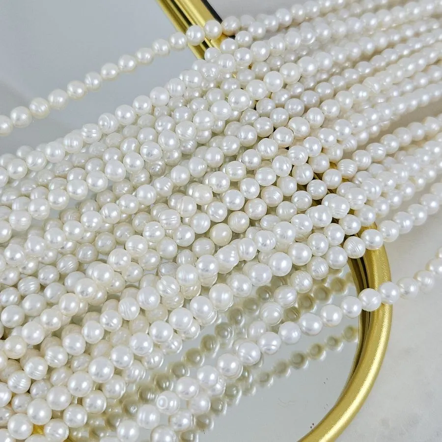 Нить 19 см Жемчуг натуральный речной ок. 4-5 мм, форма картофель, АА, белый (4616) купить с доставкой по России | Интернет-магазин Viva Beads