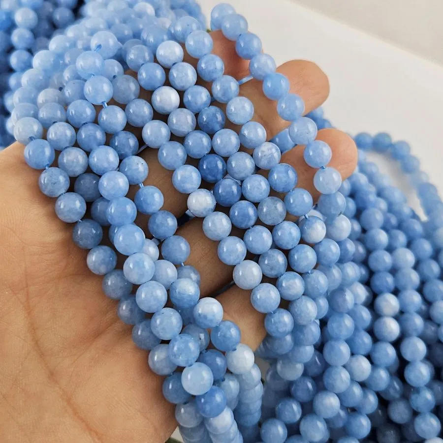 Нить 38 см Кварц тонированный 6-6.5 мм гладкие бусины, голубой  (10026-6) купить в Воронеже | Заказать в интернет-магазине Viva Beads

