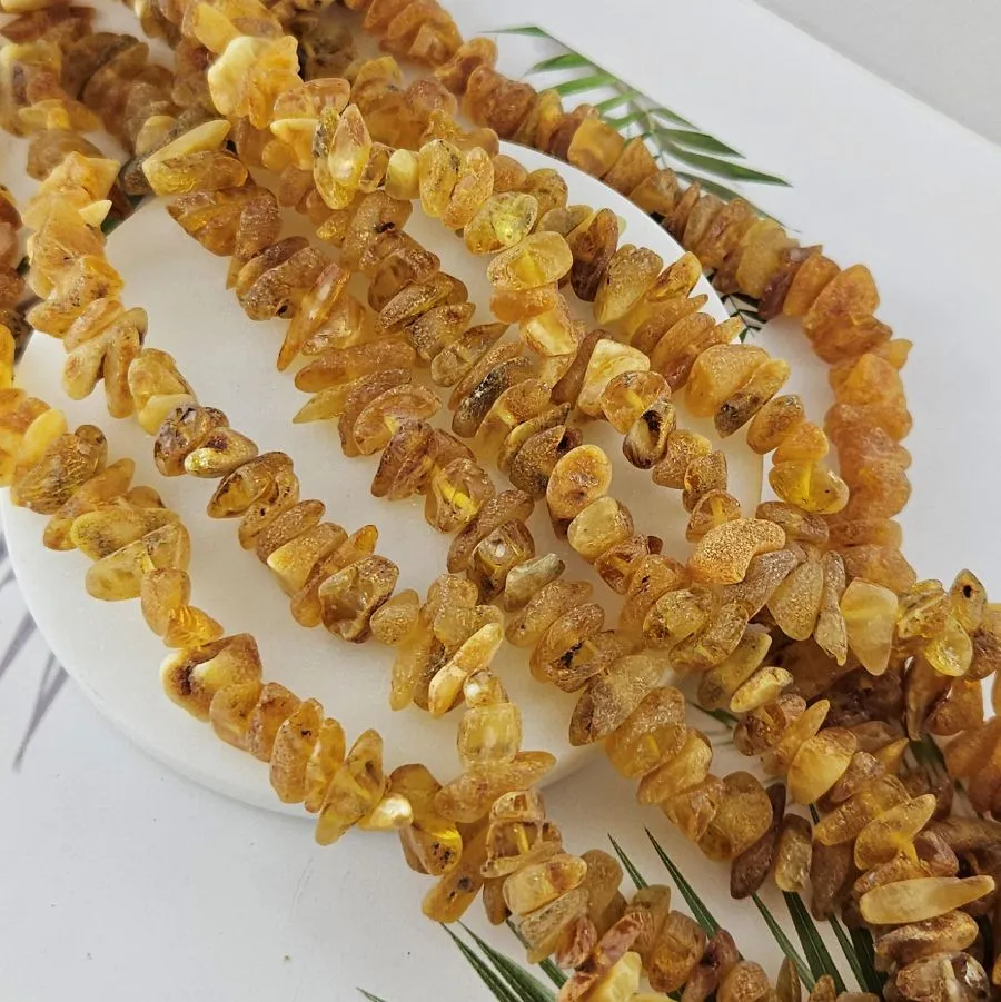 10 см Бусины из натурального нешлифованного янтаря чипсы 11-16х3-5 мм (10017) купить в Воронеже | Заказать в интернет-магазине Viva Beads
