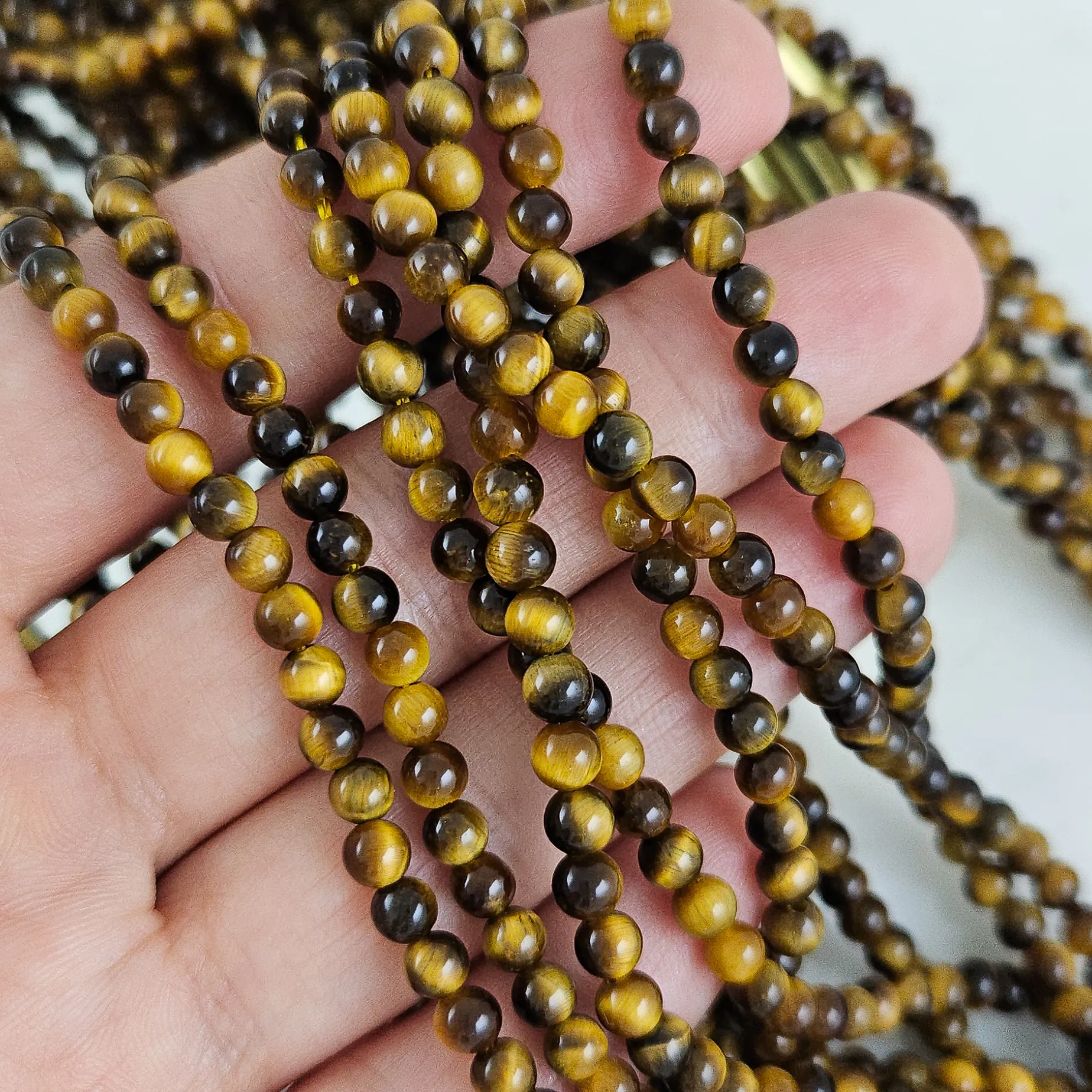 Нить 19 см Тигровый глаз натуральный ок. 4 мм, бусины гладкий шар (1002-4) для бижутерии купить с доставкой по России | Интернет‑магазин Viva Beads
