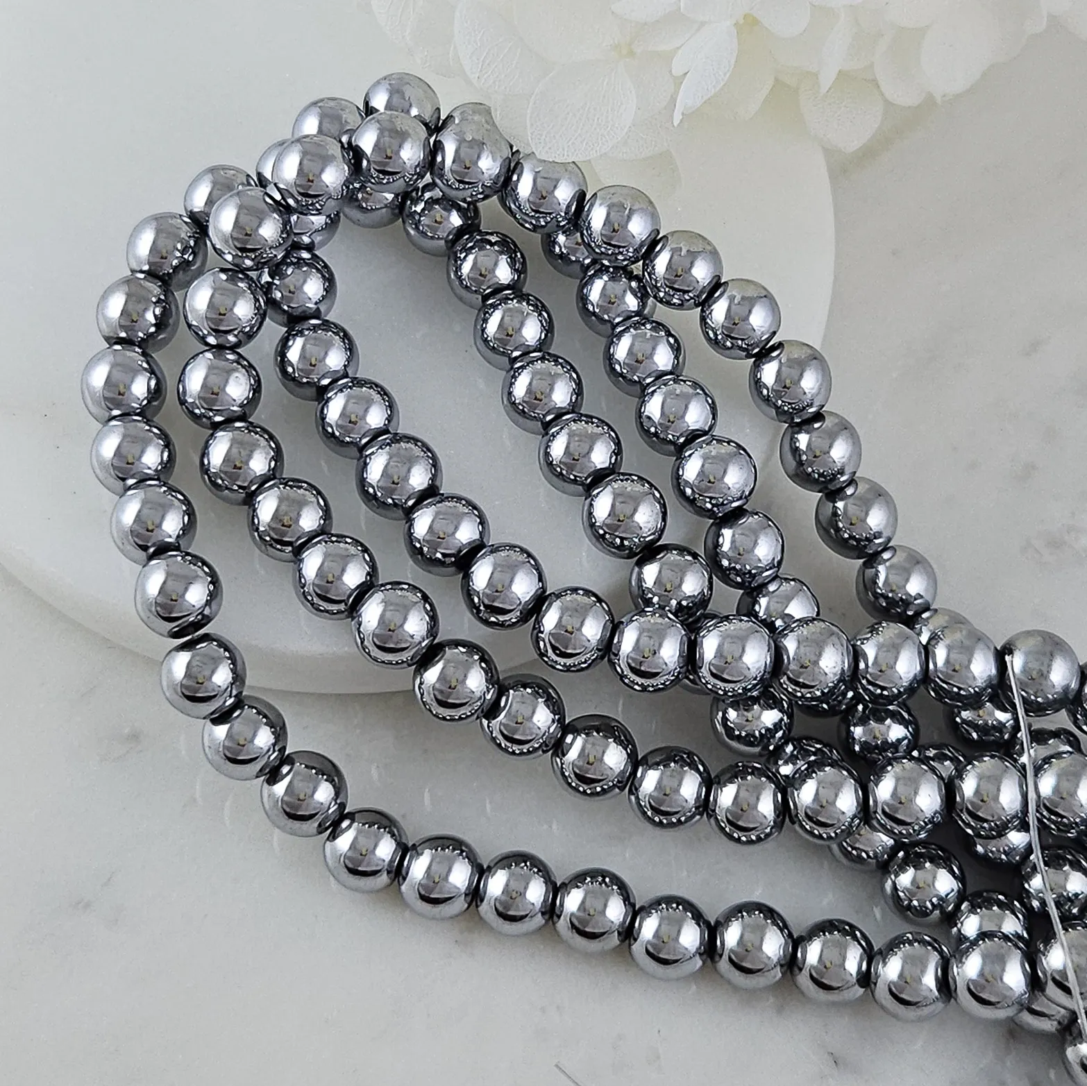 Нить 39-40 см Гематит, гематин 8 мм бусины гладкий шар, платина (6000-8/НМ) для бижутерии купить с доставкой по России | Интернет‑магазин Viva Beads
