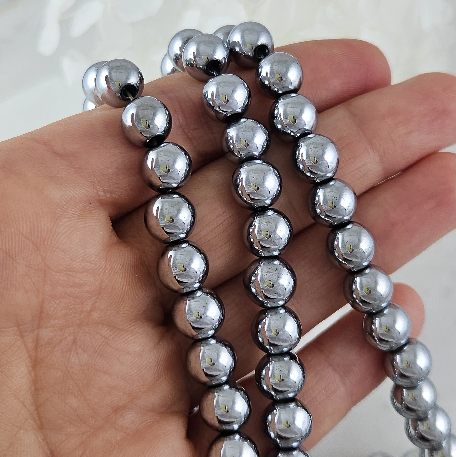 Нить 39-40 см Гематит, гематин 8 мм бусины гладкий шар, платина (6000-8/НМ) для бижутерии купить с доставкой по России | Интернет‑магазин Viva Beads
