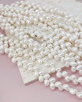 Нить 17 см  Жемчуг рис с боковым отверстием ок. 5-5.5 мм белый АА (8105) купить в #REGION_P# | Заказать в интернет-магазине Viva Beads
