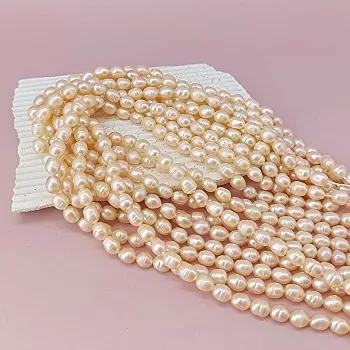 Нить 17 см Жемчуг речной рис ок. 6 мм (толщина) персиковый (4606)  купить в #REGION_P# | Заказать в интернет-магазине Viva Beads
