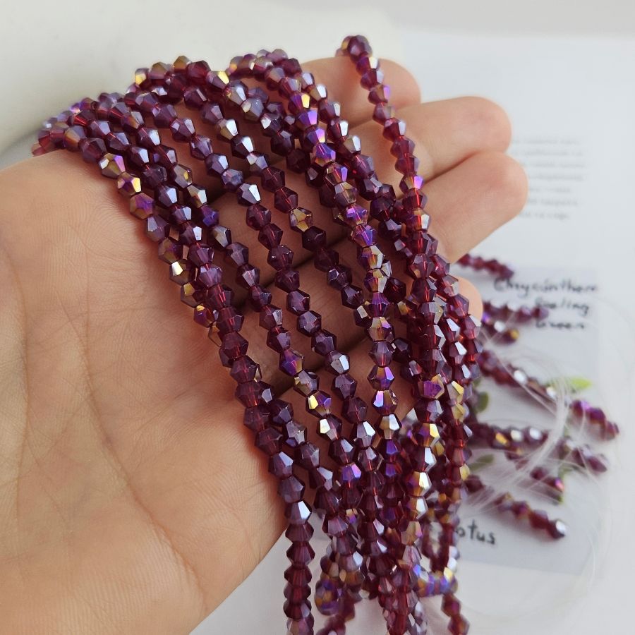 Нить 31 см Хрустальные бусины биконус 3.8х4.5 мм темно-красный АВ (8462-4-ТКРАС) Нить 31 см Хрустальные бусины биконус 3.8х4.5 мм темно-красный АВ (8462-4-ТКРАС)