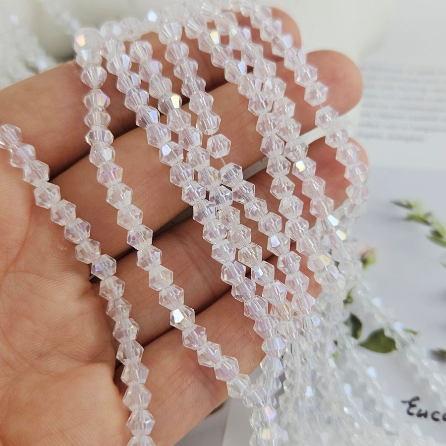 Нить 32 см Хрустальные бусины биконус 3.8х4.5 мм прозрачный АВ (8462-4-ПРОЗАВ) купить в Воронеже | Заказать в интернет-магазине Viva Beads
 Нить 32 см Хрустальные бусины биконус 3.8х4.5 мм прозрачный АВ (8462-4-ПРОЗАВ) купить в Воронеже  | Заказать в интернет-магазине Viva Beads