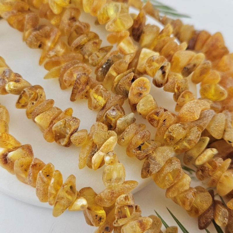 10 см Бусины из натурального нешлифованного янтаря чипсы 11-16х3-5 мм (10017) купить в Воронеже | Заказать в интернет-магазине Viva Beads
