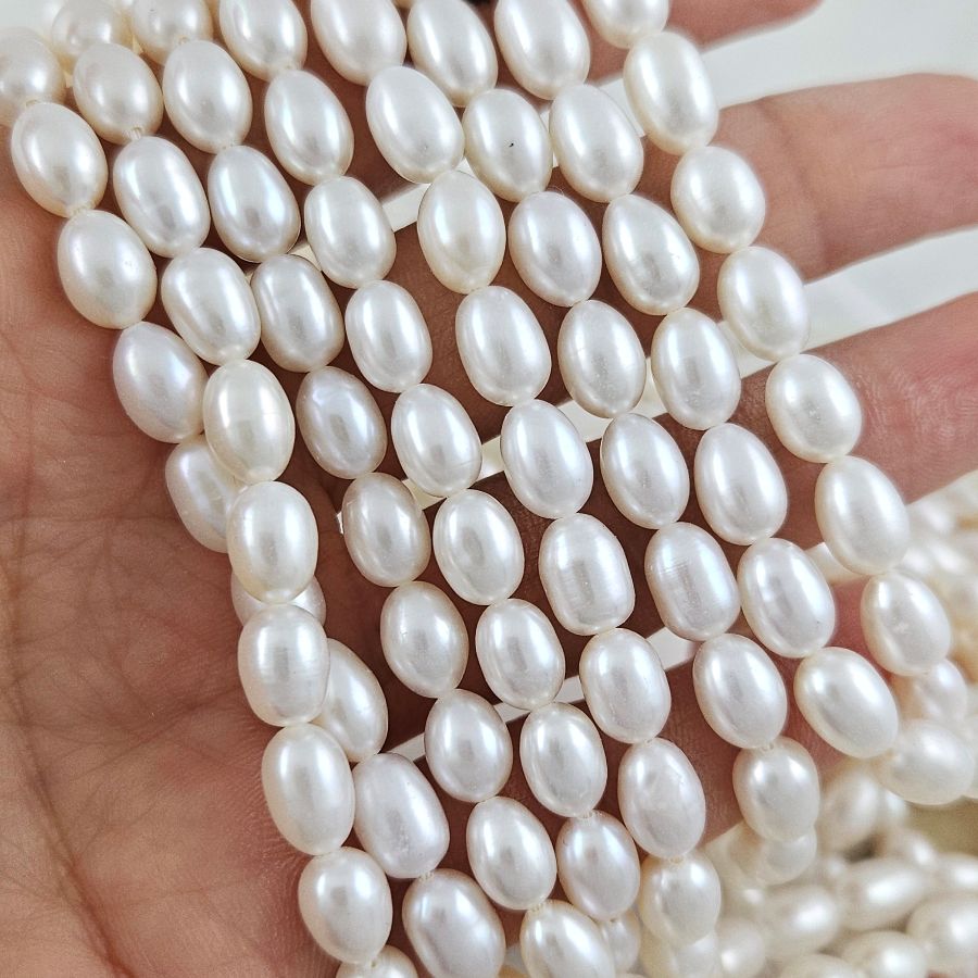 Нить 18 см Жемчуг натуральный речной рис 6-6.3х8.5-10 мм, белый АА (5582) купить с доставкой по России | Интернет-магазин Viva Beads