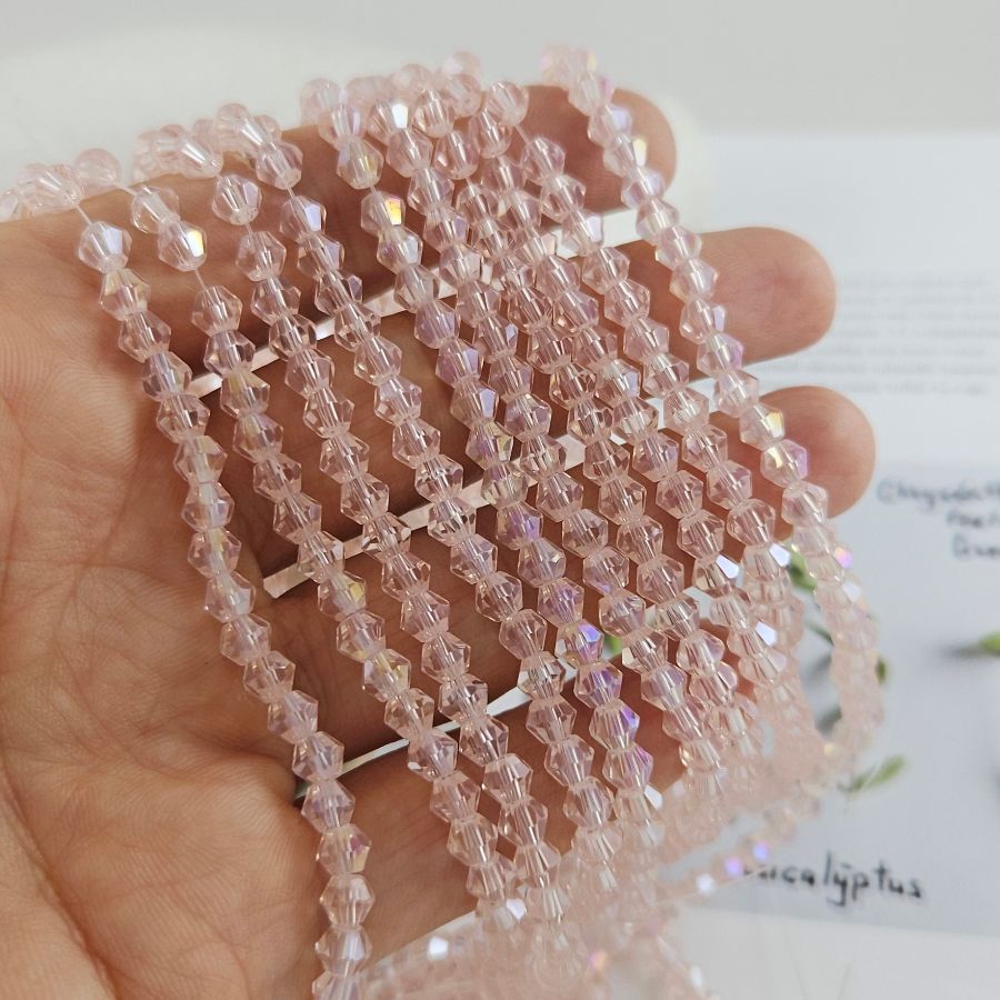 Нить 32 см Хрустальные бусины биконус 3.8х4.6 мм светло-розовый АВ (8462-4-СРОЗ) купить в Воронеже | Заказать в интернет-магазине Viva Beads
 Нить 32 см Хрустальные бусины биконус 3.8х4.6 мм светло-розовый АВ (8462-4-СРОЗ) купить в Воронеже  | Заказать в интернет-магазине Viva Beads