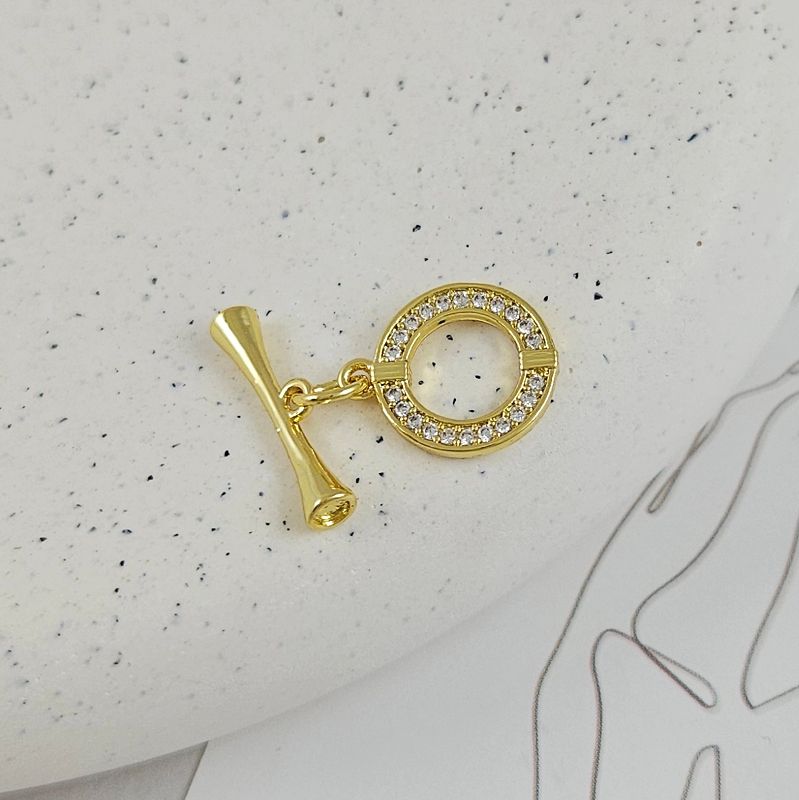 УЦЕНКА Замок тоггл круглый с фианитами, кольцо 11.7х14.2 мм позолота 14К (9485-З)