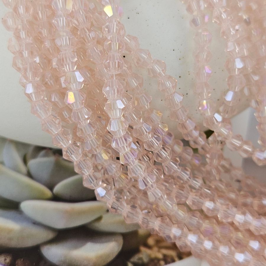 Нить 32 см Хрустальные бусины биконус 3.8х4.6 мм светло-розовый АВ (8462-4-СРОЗ) купить в Воронеже | Заказать в интернет-магазине Viva Beads
 Нить 32 см Хрустальные бусины биконус 3.8х4.6 мм светло-розовый АВ (8462-4-СРОЗ) купить в Воронеже  | Заказать в интернет-магазине Viva Beads