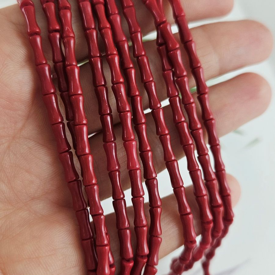 Нить 20 см Коралл тонированный ок. 7х3 мм, бусины трубочки бамбук, красный (10072-К) для бижутерии купить с доставкой по России | Интернет‑магазин Viva Beads
