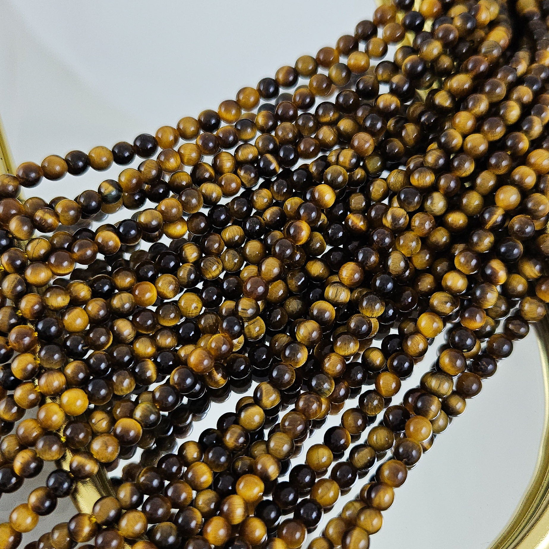 Нить 19 см Тигровый глаз натуральный ок. 4 мм, бусины гладкий шар (1002-4) для бижутерии купить с доставкой по России | Интернет‑магазин Viva Beads
