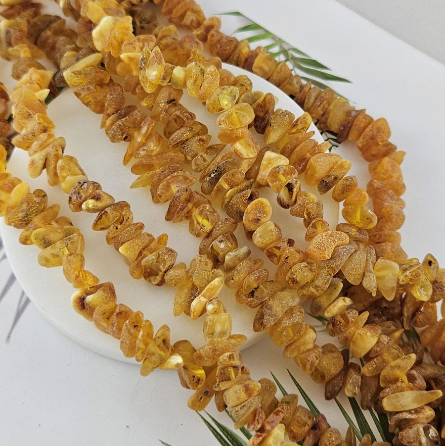 10 см Бусины из натурального нешлифованного янтаря чипсы 11-16х3-5 мм (10017) купить в Воронеже | Заказать в интернет-магазине Viva Beads
