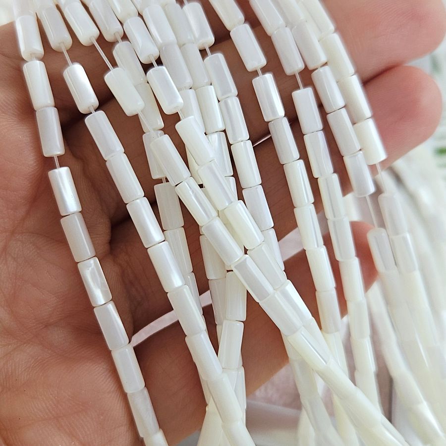 Нить 19 см Перламутр натуральный ок. 6.7-7х3 мм бусины трубочки, белый (10080-БЕЛ) для бижутерии купить с доставкой по России | Интернет‑магазин Viva Beads
