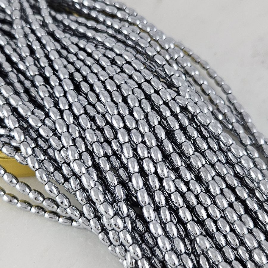 Нить 39 см Гематит, гематин 5х3.4 мм, бусины рис, цвет платина (10227-П) для бижутерии купить с доставкой по России | Интернет‑магазин Viva Beads
