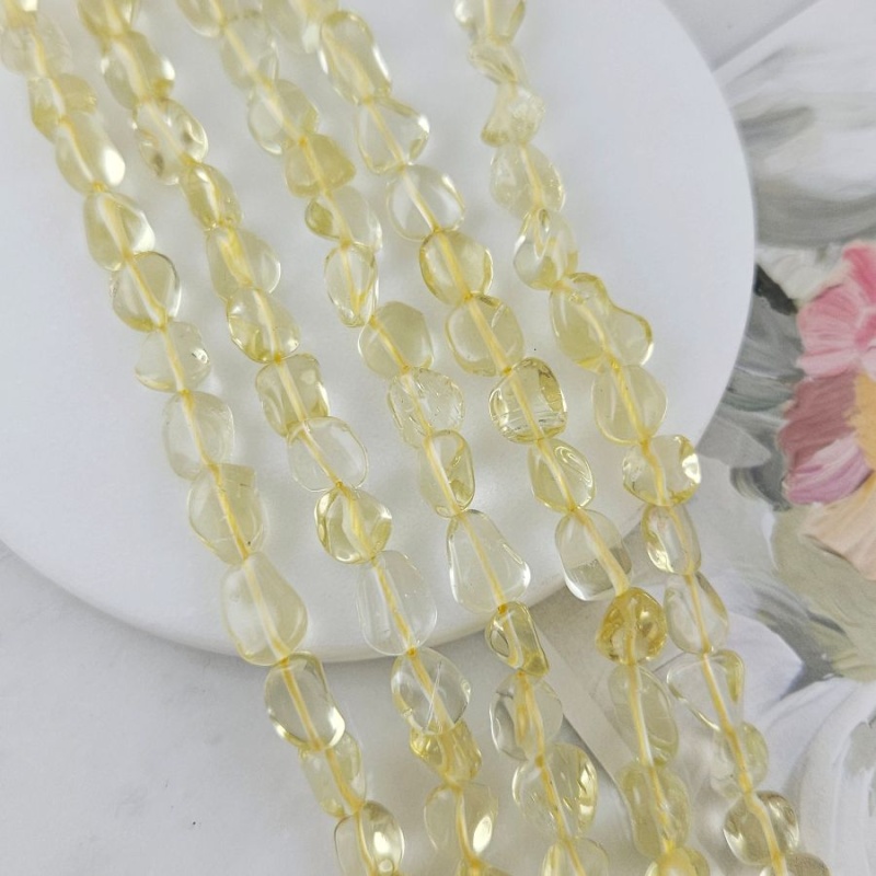 Нить 40 см Кварц лимонный синтетический ок. 4-7.5х9-12 бусины  фри форм, галтовка (9021) для бижутерии купить с доставкой по России | Интернет‑магазин Viva Beads
