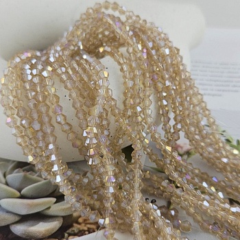 Нить 31 см Хрустальные бусины биконус 3.9х4.4 мм бежевый АВ (8462-4-БЕЖАВ) купить в Воронеже | Заказать в интернет-магазине Viva Beads
 Нить 31 см Хрустальные бусины биконус 3.9х4.4 мм бежевый АВ (8462-4-БЕЖАВ) купить в Воронеже | Заказать в интернет-магазине Viva Beads