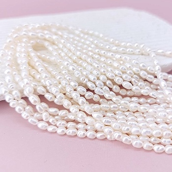 Нить 17.5 мм  Жемчуг речной рис 3 мм (толщина) белый АА (3645) купить в #REGION_P# | Заказать в интернет-магазине Viva Beads
